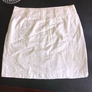 Cream color skirt with slight shimmer. Size zipper a lining